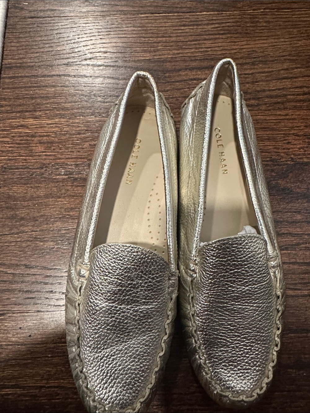 Never worn Cole Haan Metallic Gold Driving Loafers for Women